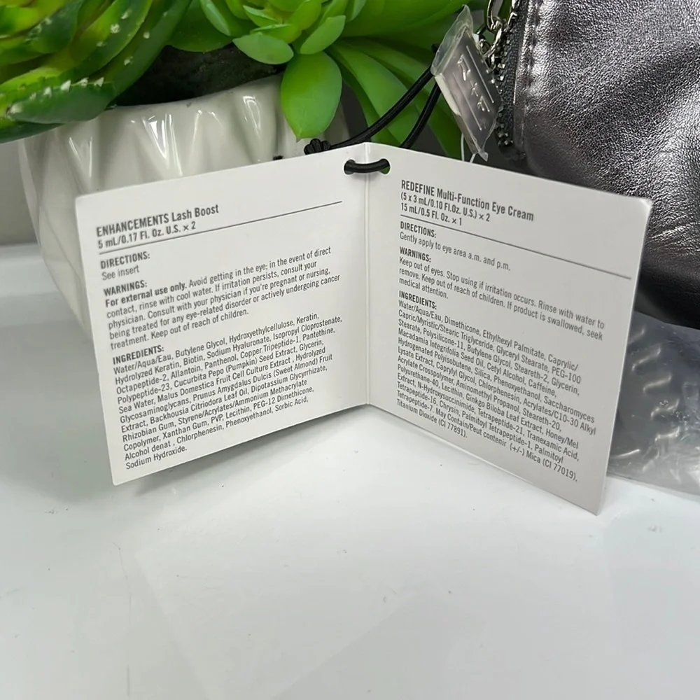 NWT Rodan + Fields Cosmetic Bag Silver with Tassel